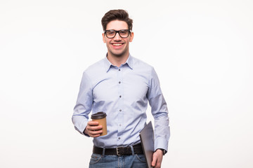 Fototapeta premium Business man in glasses and, in suit, holding laptop and cup of coffee isolated on white background