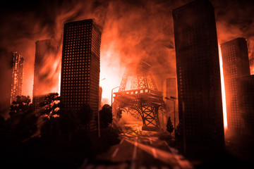 Empty street of burnt up city, flames on the ground and blasts with smoke in the distance....