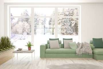 White living room with sofa and winter landscape in window. Scandinavian interior design. 3D illustration