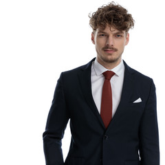 Serious businessman looking forward focused