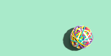 Elastic band ball with drop shadow overhead view - flat lay