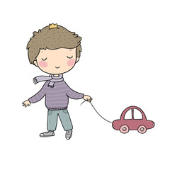 Little cute boy with a car. Kid with a toy