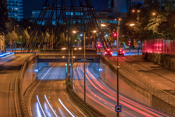 Zoom at the Effnerplatz in Munich, bavaria at night as long exposure and much traffic at the...
