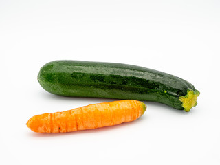 zucchini and carrot on a white background