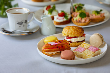 Traditional afternoon tea with canapes and cakes