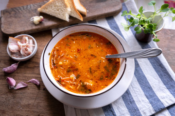 National Ukrainian and Russian borscht with lard and garlic, tomato and beetroot soup with sour cream