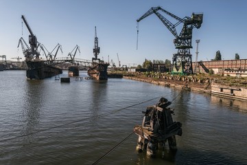 One of the largest Polish shipyards, located in Gdańsk on the left bank of the Martwa Wisła and Ostrów in Poland - obrazy, fototapety, plakaty