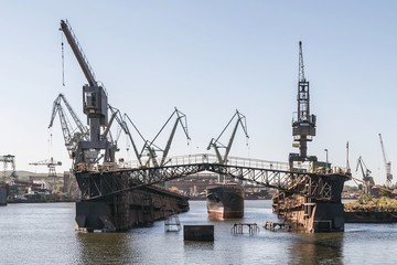 Fototapeta na wymiar One of the largest Polish shipyards, located in Gdańsk on the left bank of the Martwa Wisła and Ostrów in Poland