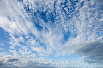 background of high-stratus clouds over a blue sky, for background, religious themes or studies of climate and meteorology