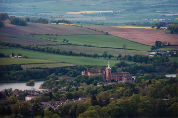 View from the top of the old Scottish town of Linlifgow, old castle and the fields. Linlithgow Palace, Scotland