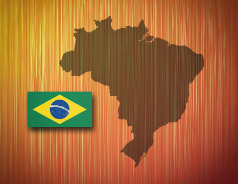 Map and flag of Brazil on a wooden background, blurred image.