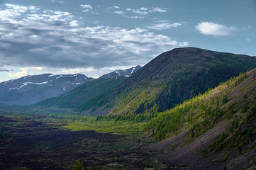 Obraz premium Wilderness. Valley and mountain on the horizon. Volcanic terrain.