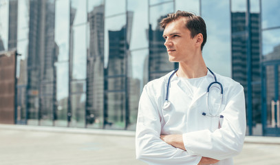 close up. ambulance doctor standing on a city street.