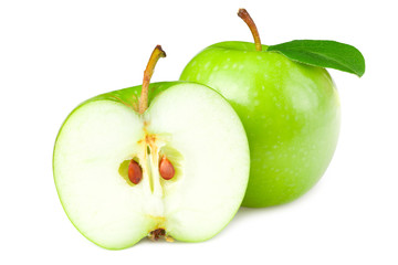 green apples with slices and green leaves isolated on white background