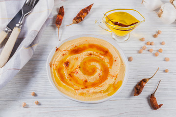 Healthy breakfast with homemade hummus on white wooden background. Diet and Healthy snack food
