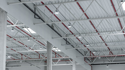 Fire suppresion system on empty clean industrial walls and cealing