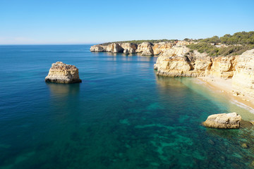  beautiful beach and coastline in the Algarve with turquoise waters 
