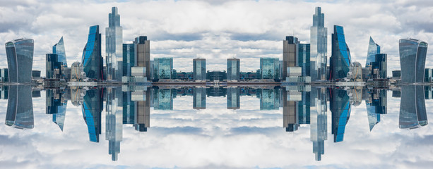 Double horizontal and vertical mirror effect of London, UK city skyline and skyscrapers
