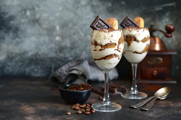Tiramisu - traditional italian dessert with mascarpone cheese, biscuit and coffee.