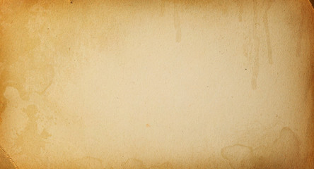 Grunge background brown, beige, old paper texture, vintage, retro, spots, smudges, stains, rough, cardboard, antique, beige paper