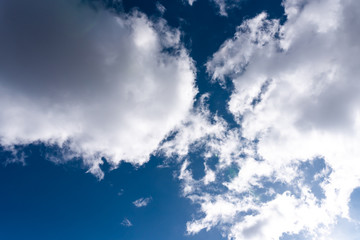 Beautiful sky with volumetric clouds, and the rays of the sun.