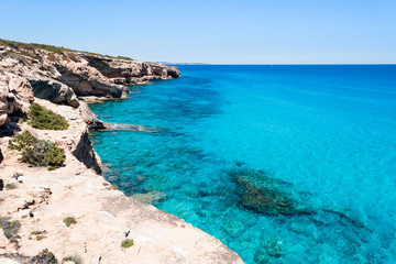 Fototapeta na wymiar Sea landscape and blue sky, Caló des Mármols, Mallorca