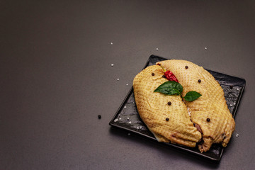 Raw duck breast and spices. Delicious ingredient for cooking healthy meal