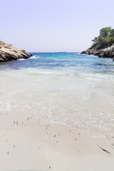 Lonely beach with blue sky, Caló de la Bella Dona, Mallorca