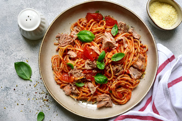 Pasta spaggeti with tuna and tomato sauce. Top view with copy space.