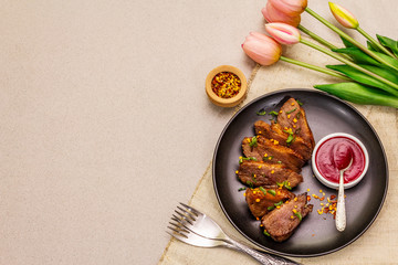 Roast and braised duck breast with sweet and sour berry sauce