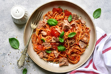 Pasta spaggeti with tuna and tomato sauce. Top view with copy space.