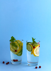 Sassy diet water. Cucumber, lemon, mint beverage in glasses
