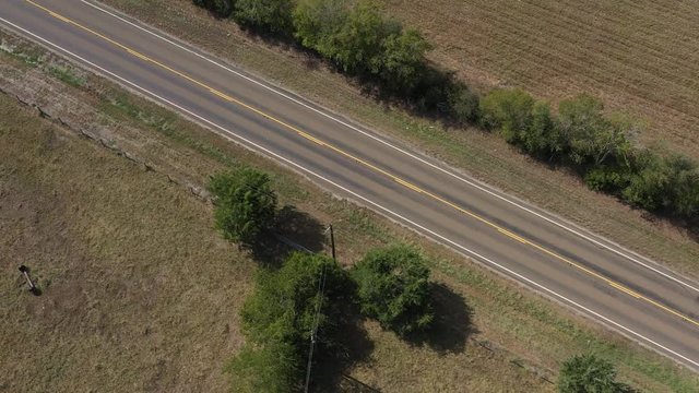 Country highway and pastures, Burleson County, Texas, USA