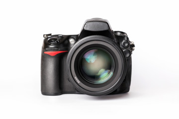 Digital SLR camera with lens on a white background