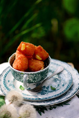Fried camembert with viburnum jam.