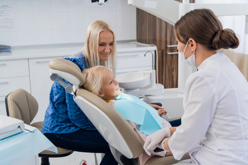 A child having a regular checkup at the dentist's office