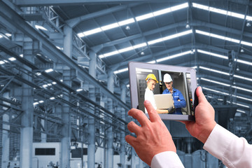 businessman working at a home office with a laptop on table. VDO conference call with business partner group.Concept of male freelancer business.