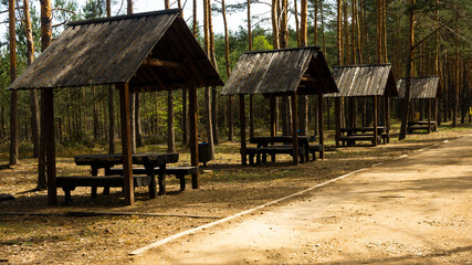 
Wooden picnic houses in the Gor Sokolich reserve in Olsztyn. Free space for an inscription