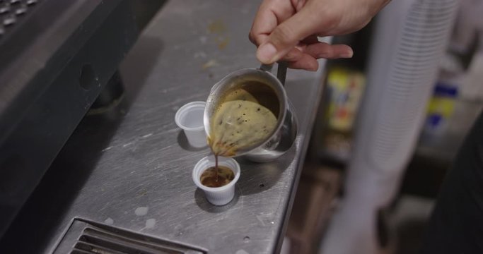 Woman preparing cuban coffee