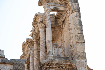 Kusadasi, Turkey - April 28, 2019: People visiting Celsus Library and old ruins of Ephesus or Efes famous site