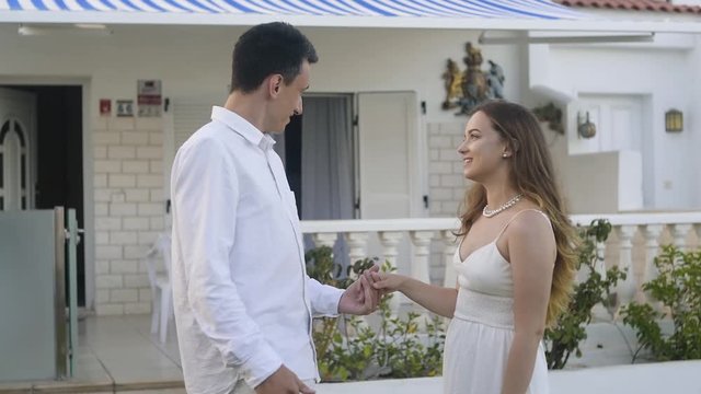 Man with Tourette syndrome in a happy marriage. A man is talking to a girl.