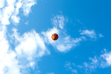  Hot air Balloon flying high and  blue sky seen from under
