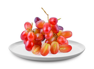 Red grape in white plate isolated on white background