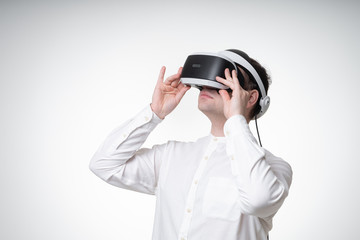 young man wearing vr glasses