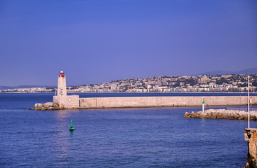 The lighthouse at the Port of Nice on the Mediterranean Sea at Nice, France along the French Riviera.