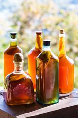dramatic image of fresh kombucha probiotic drink fermenting with fresh mango for flavoring, made with black tea.