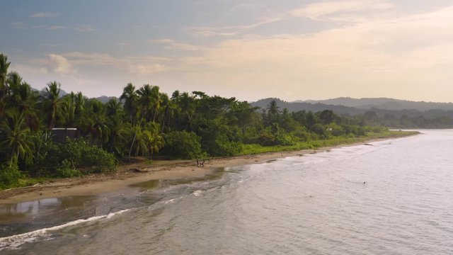 Beach of the Pacific Ocean with rainforest in Choco, Colombia, near Nuqui, drone aerial view
