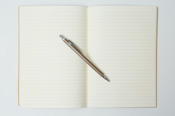 Top view of Pen, notebook  on white background