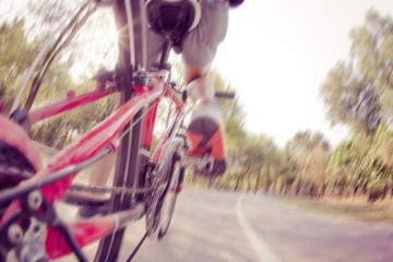 Cyclist with mountain bike on park. Soft focus