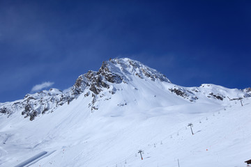 Fototapeta na wymiar Panoramic view of the mountains of France on a winter sunny day. Haute Savoy, France. Snow Park.